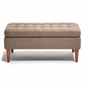 Fabric ottoman with tufted top and wooden legs in beige color 100 x 50 x 40cm